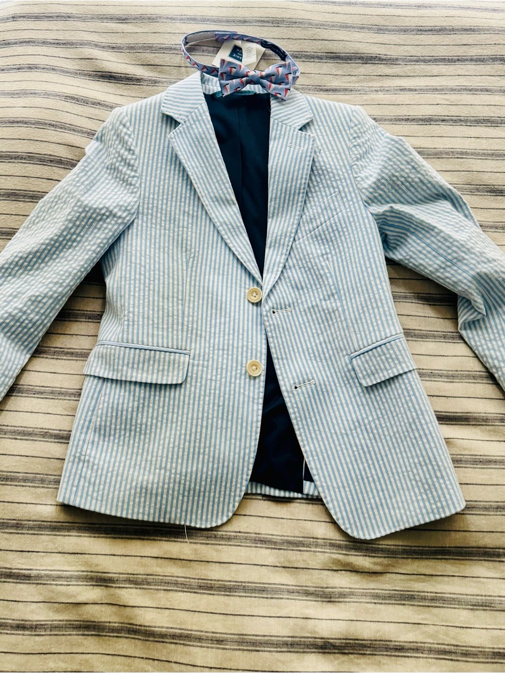 Vineyard Vines jacket & coat and a  Janie and Jack tie.
